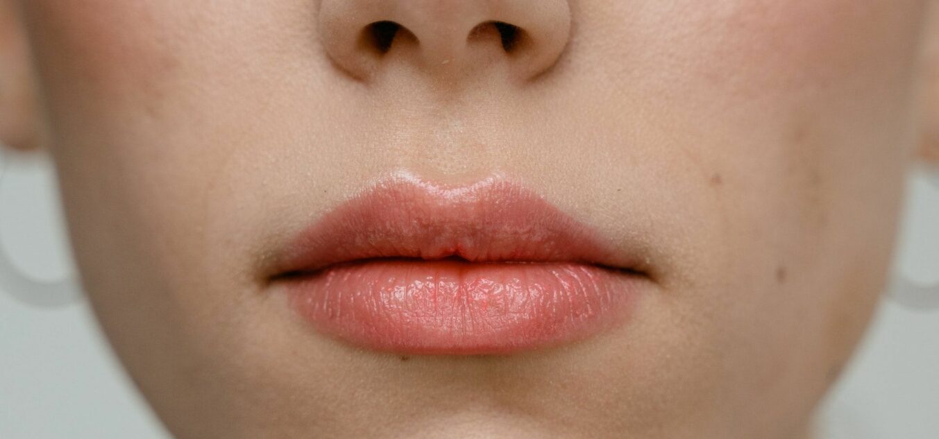 Chapped lips can be caused due to dehydration and dryness. (Photo via Pexels/MART  PRODUCTION)