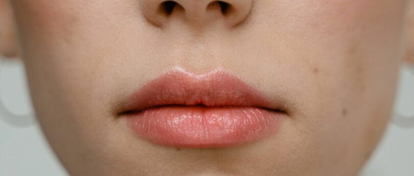 Chapped lips can be caused due to dehydration and dryness. (Photo via Pexels/MART  PRODUCTION)