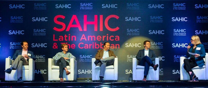 From left: IHG Hotels &amp; Resorts' Paul Adan, Hilton's Juan Corvinos, Hyatt Hotels Corporation's Camilo Bolaños and Marriott International's Bojan Kumer speak with Hotel News Now's Stephanie Ricca about hotel brand expansion priorities at the SAHIC Latin America &amp; The Caribbean Hotel &amp; Tourism Investment Forum. (SAHIC)